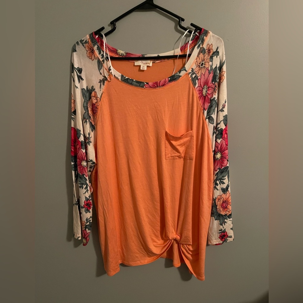 New coral top with floral sleeves